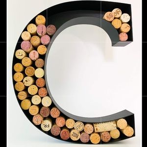 Black metal hanging wine cork holder - letter “C”